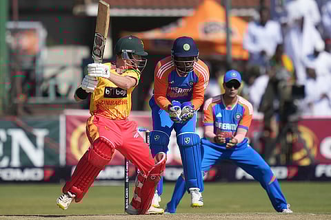 Jonathan Campbell plays a shot against India